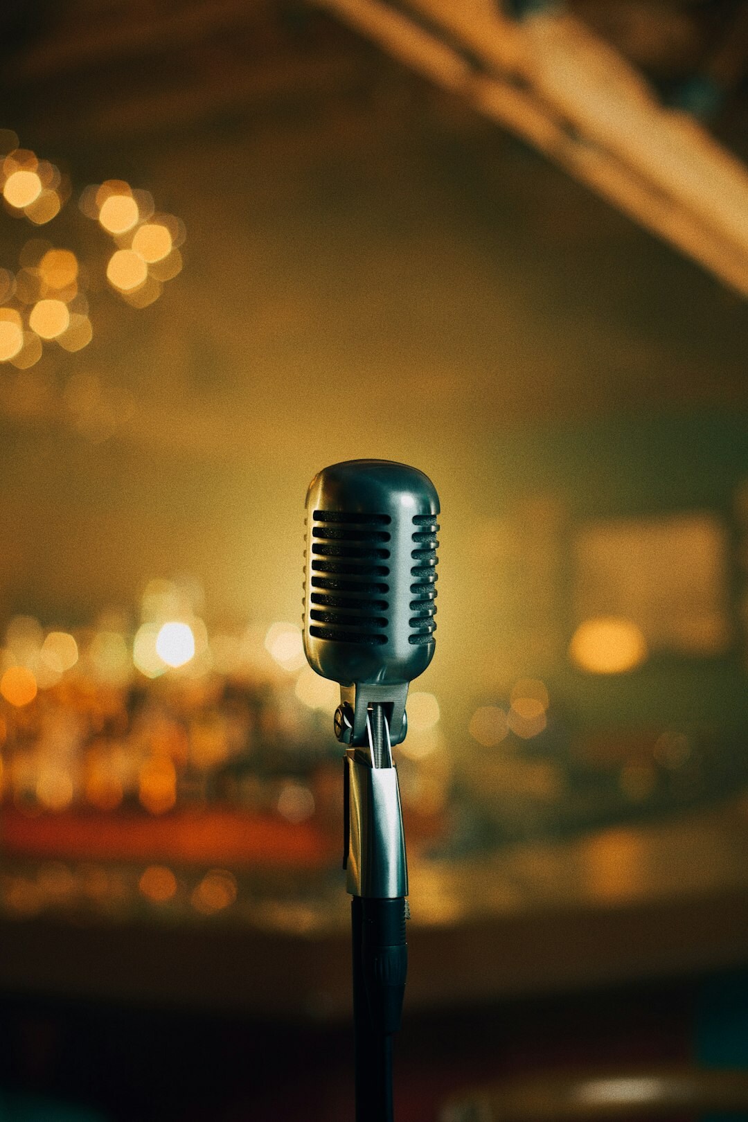 Vintage microphone on a talk show set with warm studio lighting