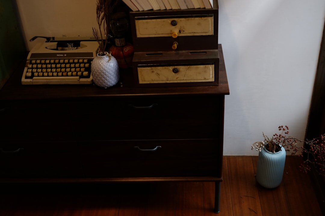 Vintage wooden desk with a typewriter, envelopes and old letters