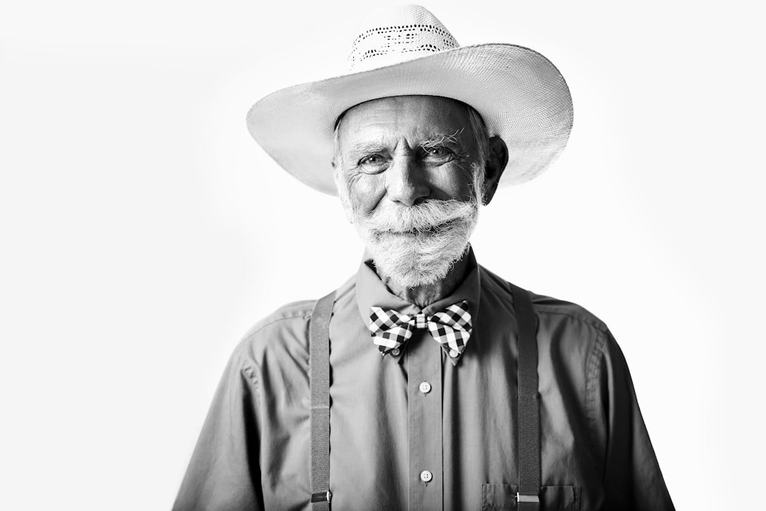 Distinguished Uruguayan man in his sixties posing for a formal studio portrait