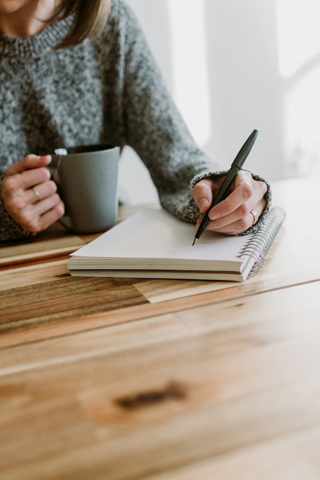 female author writing